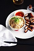 Char siu (barbecued pork, China) with rice and chilli sauce