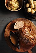 Roast pork with white cabbage and bread dumplings