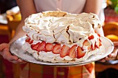 Pavlova with creamy lemon filling and strawberries
