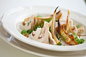 Fricassee of chicken breast with parsley root, mushrooms, parsley and fennel