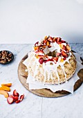 Angel food cake with fruit and pecan nuts