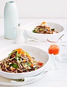 Spelt spaghetti with smoked trout, caviar and courgette