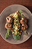 Rosemary skewers with lamb fillet and tabbouleh