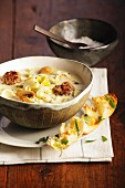 Leek and cheese soup with meatballs
