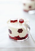 Creamy dessert with jelly flowers