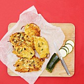 Courgette fritters on paper
