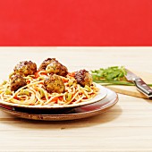 Spaghetti with meatballs and tomatoes
