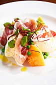 Melon with smoked ham and peas
