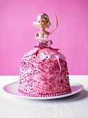 A pink Barbie cake for a child's party