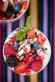 Eton Mess with fresh berries and pomegranate seeds (England)