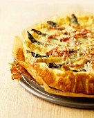 Asparagus quiche with strips of bacon
