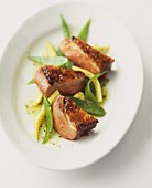 Duck breast fillet with mange tout and baby sweetcorn