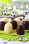 Football candles in chocolate marshmallows