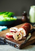 Chicken roulade stuffed with quinoa, pine nuts and sundried tomatoes