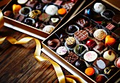 Assorted filled chocolates in chocolate boxes