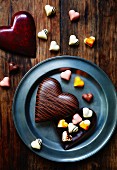 Heart-shaped chocolates with a heart-shaped chocolate box