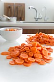 Carrots, cut into slices, in the kitchen