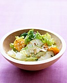 Coconut and tangerine salat with green apples