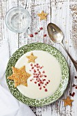 Cauliflower soup with diced bacon and star-shaped croutons