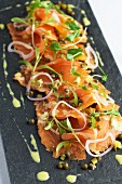 Gravad lax with citrus marinade, onions and capers