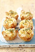 Mini puff pastry pies filled with pears and thyme