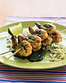 A prawn skewer with a lime & mint sauce