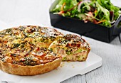 Salmon quiche with dill and peas, with a side of salad