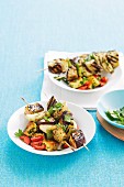 Vegetable skewers with herb halloumi