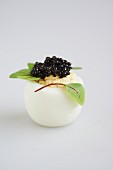 Deviled Egg with Truffle Oil Topped with Caviar and Garnished with Micro Greens