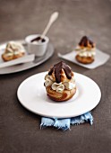 Profiterole with ricotta cream and chocolate topping