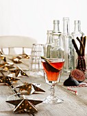 Fig Cocktail with Christmas Decorations & empty bottles