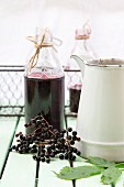 Elderberry juice in glass bottles