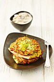 Courgette fritters with mushroom sauce