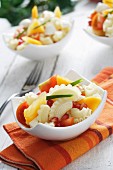 Pasta salad with Japanese persimmon and goat's cheese