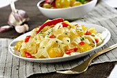 Tagliatelle with yellow cherry tomatoes and red chillis