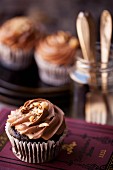 Nutella Cup Cake garnished with hazelnuts
