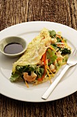 Omelette with prawns, vegetables and coriander (Asia)
