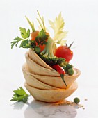 Fresh vegetables in a stack of wafer cups