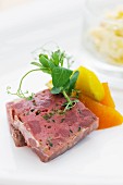 Game terrine with apple and shallots