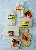 Assorted types of noodles from Asia, with labels