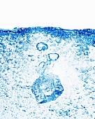 An ice cube in mineral water