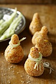 Fried pumpkin tops filled with either sesame seeds or chestnuts