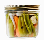 Vegetables pickled in vinegar, in a screw-top jar