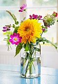 Bouquet with double sunflower & cosmea in glass vase