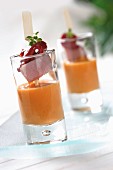 Salmorejo (creamy, cold soup, Spain) with a skewer of fish