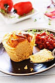 Fish soufflé with a tomato and pepper sauce