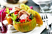 Stuffed tomatoes with tuna salad, olives and peppers