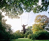 Young girl on swing