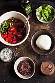 Ingredients for tomato salad with mozzarella and tapenade
