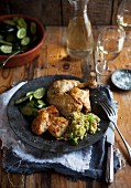 Chicken leg with potatoes, courgette and couscous